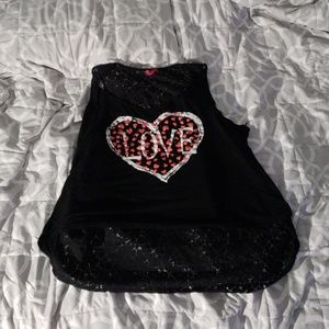 Black crop top with the word love on it